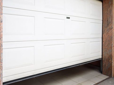 common reasons why a garage door is not opening properly